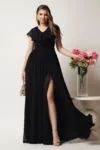Rochie DY Fashion lunga neagra in clos din voal cu volanas la bust si crapatura pe picior