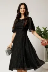Rochie DY Fashion midi neagra din voal in clos cu fir lurex si accesoriu la decolteu