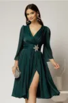 Rochie DY Fashion turcoaz din voal cu pelicula decolteu petrecut si detaliu pe talie