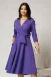 Rochie Dy Fashion mov cu decolteu petrecut si funda maxi