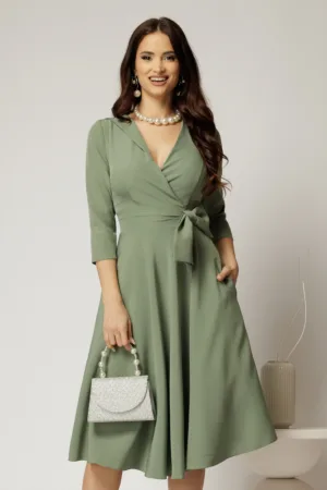 Rochie Dy Fashion verde fistic cu decolteu petrecut si funda maxi