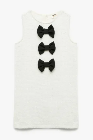 Rochie cu aspect texturat si aplicatii din funda