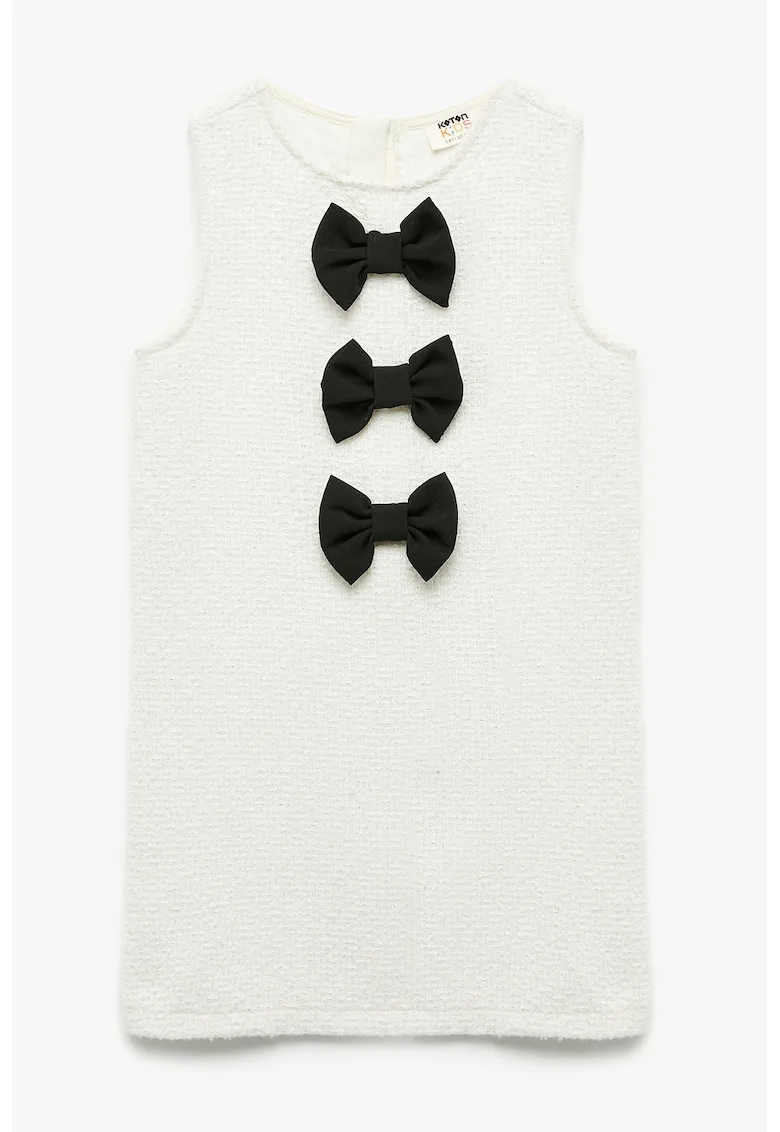 Rochie cu aspect texturat si aplicatii din funda