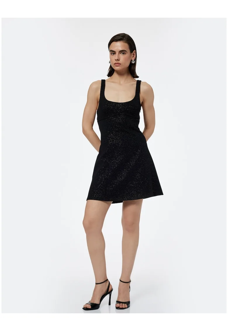 Rochie cu croiala in A - insertii stralucitoare si funda pe spate