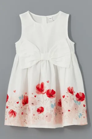 Rochie cu model floral si aplicatie funda pe partea din fata