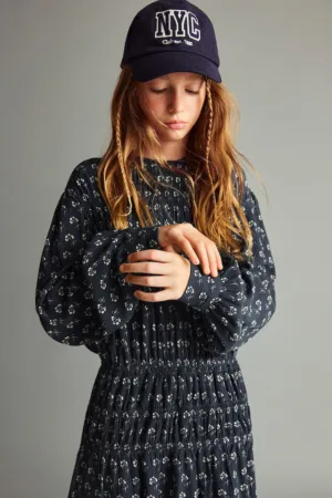 Rochie cu model floral si insertii elastice