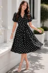 Rochie de zi neagra Ayana in clos cu buline albe