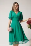 Rochie eleganta din crep verde cu volane din tull la maneci
