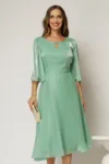 Rochie eleganta verde din voal peliculizat cu decolteu cu decupaj