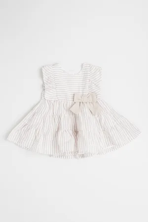 Rochie evazata din bumbac si in cu aplicatie cu funda