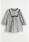 Rochie in carouri cu croiala A