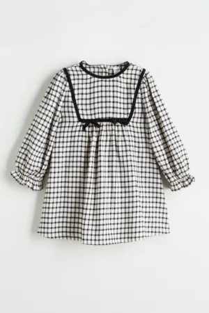 Rochie in carouri cu croiala A