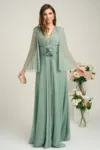 Rochie lunga de ocazie din tull verde fistic cu floare in talie