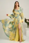 Rochie lunga de ocazie din voal galbena cu imprimeuri verde mint si strasuri in talie