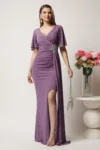Rochie lunga lila din lurex cu floare in talie si croi mulat