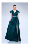 Rochie lunga verde din tafta cu pene la umeri si strasuri pe talie
