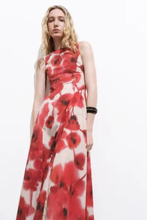 Rochie midi cu croiala evazata si model abstract