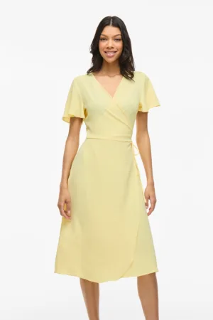 Rochie midi cu croiala petrecuta si decolteu cache coeur