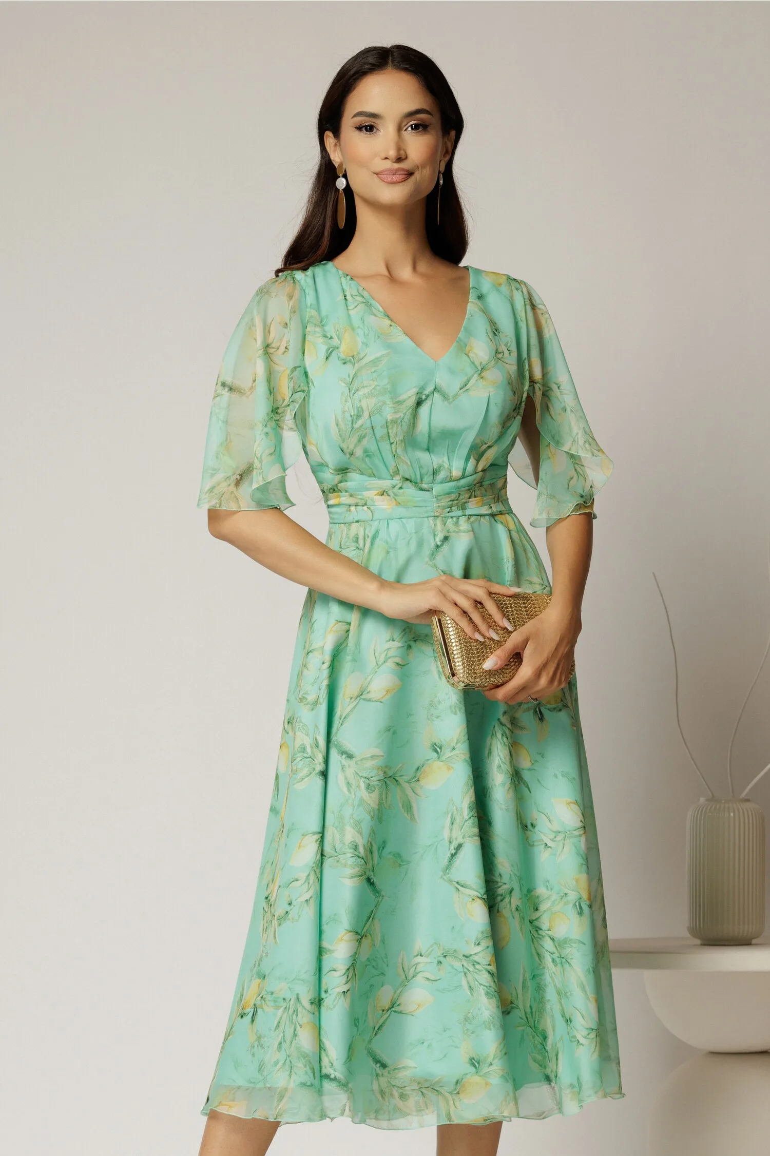 Rochie midi din voal verde menta cu imprimeu galben