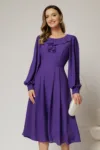 Rochie midi mov din voal plin cu volanase la bust