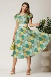 Rochie midi verde din bumbac in clos cu imprimeu geometric lime si cordon in talie