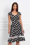 Rochie neagra cu buline albe si banda semitransparenta la baza