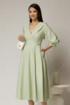 Rochie office de ocazie din stofa verde fistic deschis cu bust petrecut si rever