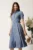 Rochie DY Fashion albastra in clos cu nasturi si curea in talie