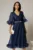 Rochie DY Fashion bleumarin din voal creponat cu volanase si decolteu in V