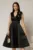Rochie DY Fashion din tafta neagra cu floare ampla cu perla pe umar