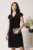 Rochie DY Fashion din triplu voal neagra cu funda la decolteu