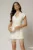 Rochie DY Fashion ivoar cu decolteu adanc rotund si dantela pe fusta