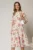 Rochie DY Fashion midi cu imprimeu oranj cu maneci evazate si funde pe bust