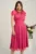 Rochie DY Fashion midi fucsia din voal in clos cu accesoriu si decupaj la decolteu