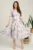 Rochie DY Fashion midi lila din voal in clos cu print mov si funda in talie