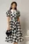 Rochie DY Fashion midi neagra cu buline din poplin cu guer ascutit si maneci scurte bufante