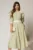 Rochie DY Fashion midi verde fistic cu buline si funda ampla pe umar