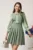 Rochie DY Fashion office din stofa verde fistic cu maneci din voal si funda pe bust