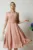 Rochie DY Fashion office din triplu voal roz cu nasturi la bust si curea in talie