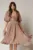 Rochie DY Fashion roz cu decolteu adanc si nasturi din voal peliculizat
