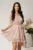 Rochie DY Fashion scurta alba din voal cu flori roz si cordon in talie