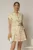 Rochie DY Fashion scurta galbena cu floricele si fusta cu pliuri