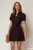 Rochie DY Fashion scurta mov cu nasturi decorativi la bust si pliuri pe fusta