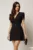 Rochie DY Fashion scurta neagra cu maneci scurte cu perle si decolteu petrecut