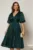 Rochie DY Fashion turcoaz cu decolteu adanc si nasturi din voal peliculizat