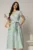 Rochie DY Fashion verde menta cu buline cu decolteu petrecut si cordon in talie