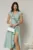 Rochie DY Fashion verde menta midi cu volanas pe fusta si detaliu amplu foral