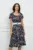 Rochie Karina bleumarin cu flori rosii si curea in talie