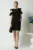 Rochie LaDonna office din stofa neagra cu volane la maneci