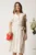 Rochie alba cu buline colorate in clos cu cordon in talie